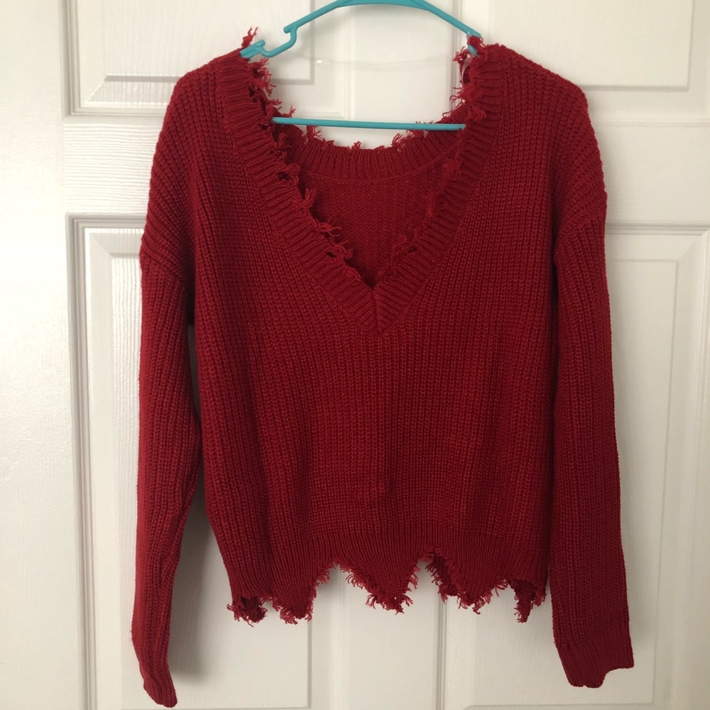 Red frayed sweater